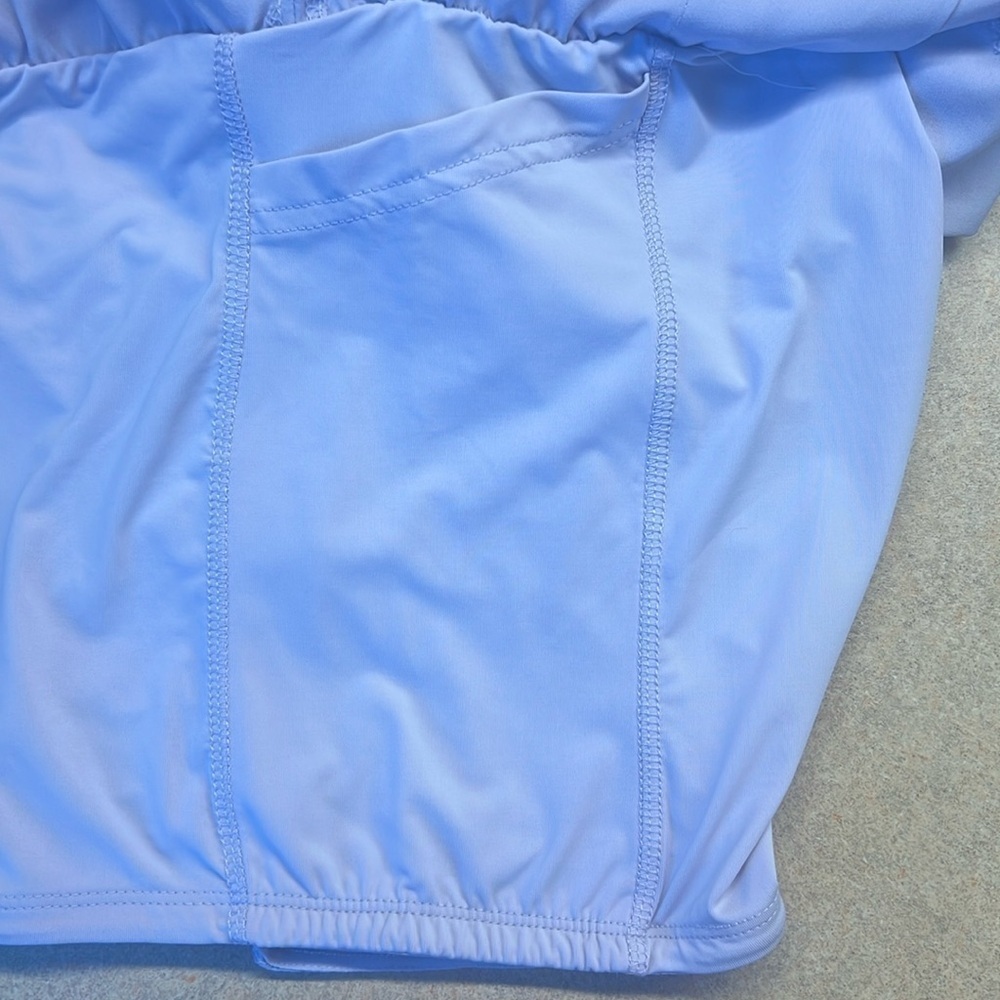 GB Sport Lilac skort. 2 side pockets on shorts under the skirt. Size L NWT - Picture 10 of 13